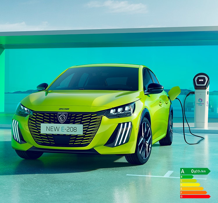 New PEUGEOT E-208 Yellow Agueda charging at a private terminal